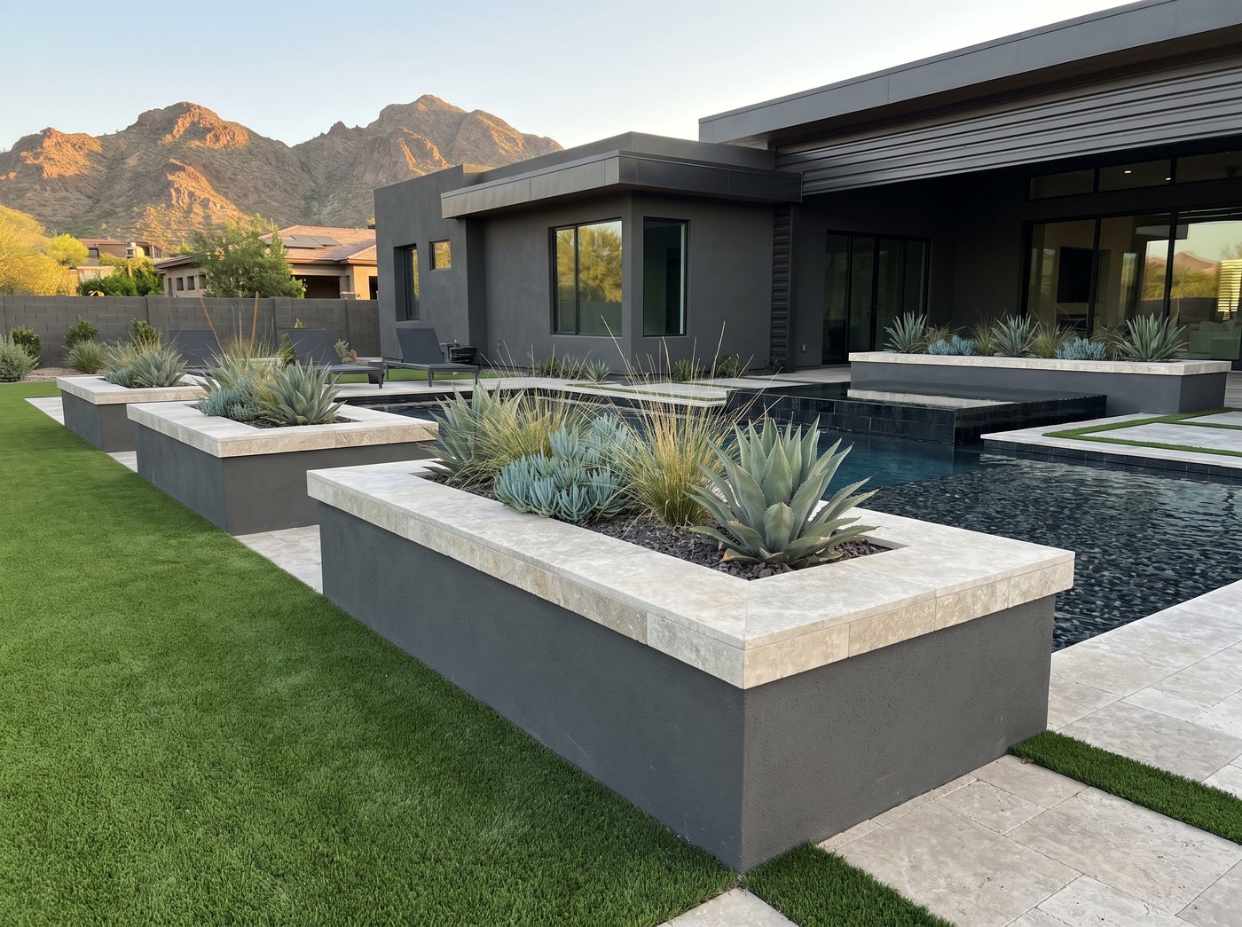 Rendering of raised charcoal stucco planters with travertine caps and agave beside a pool